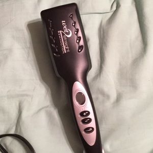 Remington wet 2 straight flat iron. Works great!!